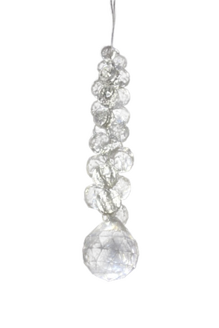 A hanging ornament featuring a cluster of faceted acrylic beads with a maple leaf design at the end.
