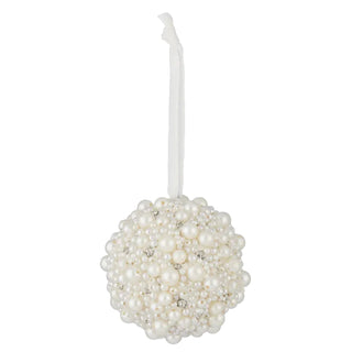 Pearl ornament with a hook on a white background