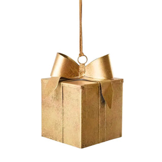 Gold gift box ornament with a bow on a white background