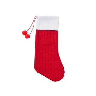Red Christmas stocking with white cuff on a white background
