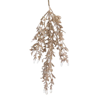 Decorative hanging plant with gold leaves on a white background