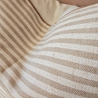 Close-up of beige and white striped fabric