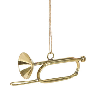 Gold trumpet-shaped ornament hanging on a white background