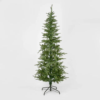 Tall artificial Christmas tree on a white background