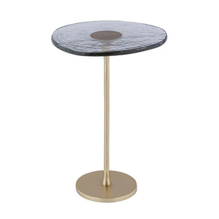 Small round table with ripple glass top and gold metal legs on a white background