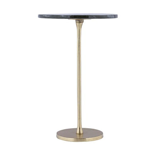 Small round table with a rippled glass top and gold metal base on a white background