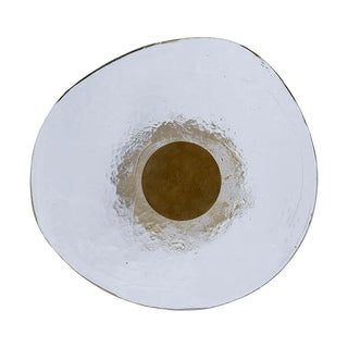 Round ceramic plate with a central brown circle on a white background