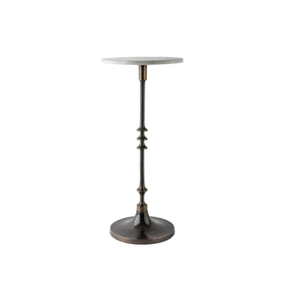 Small round table with a white top and bronze base on a white background