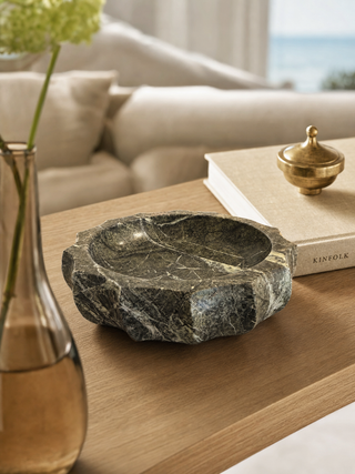 Green marble scalloped bowl styled on console table - Gray & Co