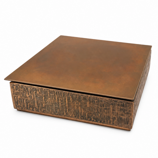 Lador Switzerland Dr Schivago copper and brass musical jewellery box, closed view on white studio background